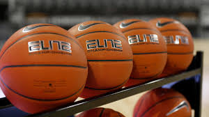 Elite basketballs on a rack